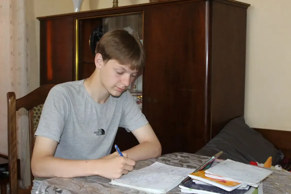 Kolya is attending online tutoring classes_ASB Georgia.webp